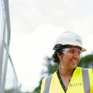 Photo Of Female Engineer Wearing Hard Hat And Yellow Vest